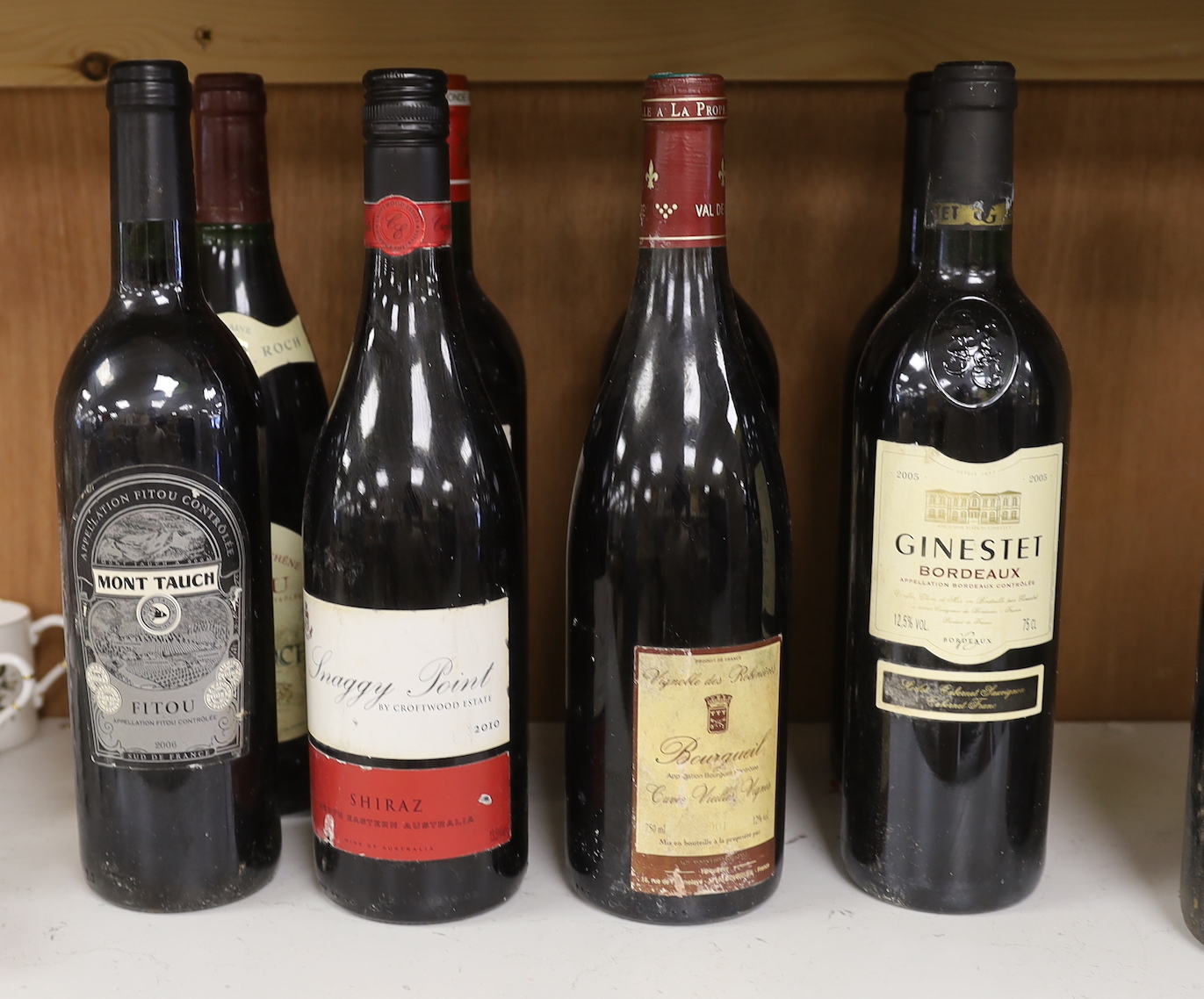 Twelve bottles of various wine